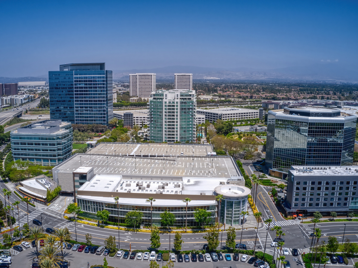 Low Altitude Aerial View Of Downtown Irvine, California In Spring